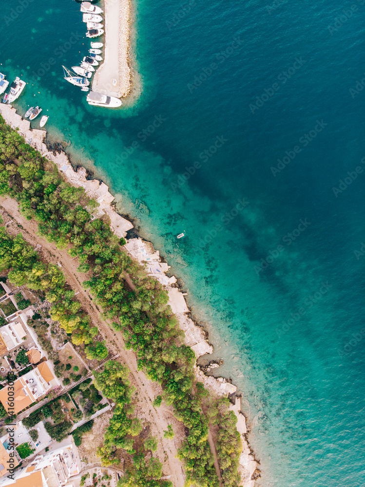 Croatia coast, Adriatic sea. Beautiful seascape and rocks, overhead view from drone in Drage, Pakoštane.