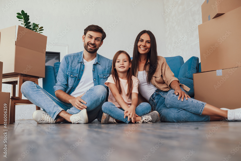 Young couple and child being ready to move out of house Young couple and child being ready to move out of house