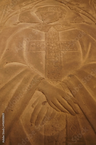 Tomb slab of the priest lando di gianni da montevettolini in the crypt of Santa Reparata in Florence, Italy photo