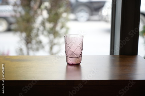 empty glass on wood table in cafe
