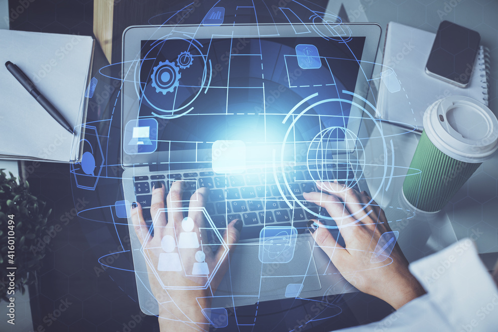 Double exposure of woman hands typing on computer and social network theme hologram drawing. People media concept. Double exposure of woman hands typing on computer and social network theme hologram drawing. People media concept.