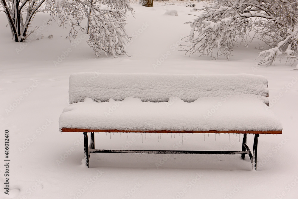custom made wallpaper toronto digitalA bench in a winter park covered with fluffy snow.