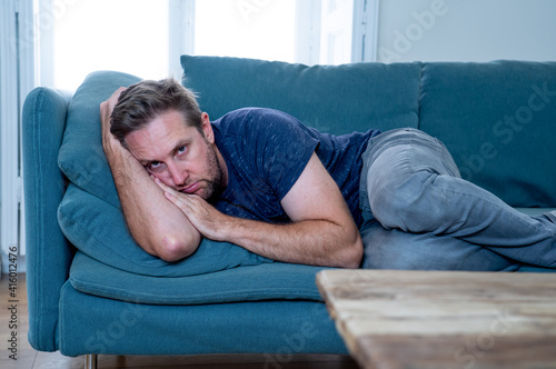 Fotografija Young man suffering from depression feeling lonely, distressed and hopeless isol
