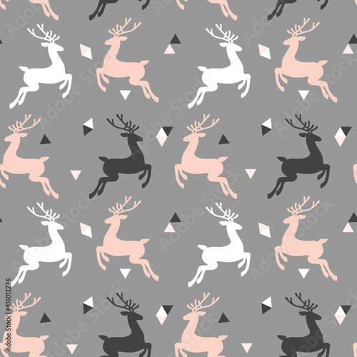 Fototapeta Naklejka Na Ścianę i Meble -  Vector seamless pattern with deer and triangles. Background for wallpaper, packagings, postcard, birthday, textiles, paper, holiday.