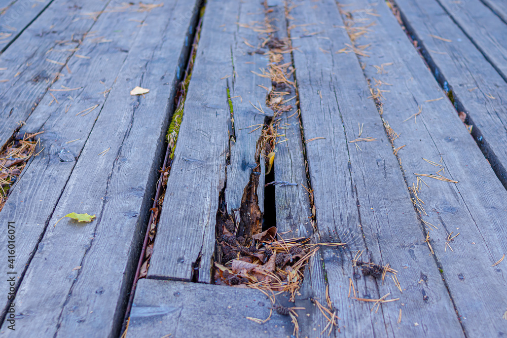 Rotten planks on the surface of the old pier. Soft Focus Rotten planks on the surface of the old pier. Soft Focus
