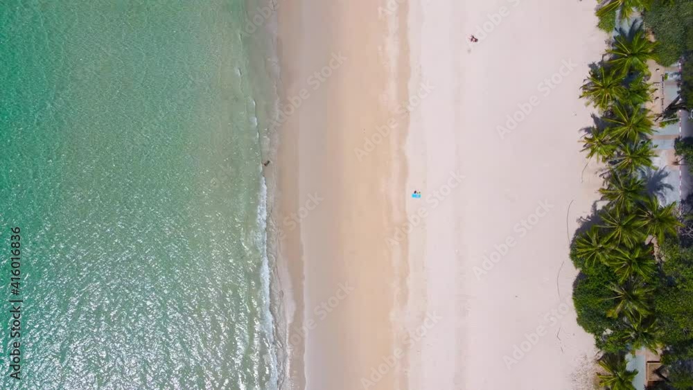 (Top view) Aerial view drone over beach sea. Beautiful sea waves. Rock beach and amazing sea. Summer seascape. Phuket Thailand Beach. Water texture. Top view of the fantastic natural sunsets (Top view) Aerial view drone over beach sea. Beautiful sea waves. Rock beach and amazing sea. Summer seascape. Phuket Thailand Beach. Water texture. Top view of the fantastic natural sunsets