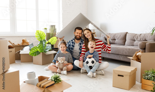 Happy family under roof in new apartment