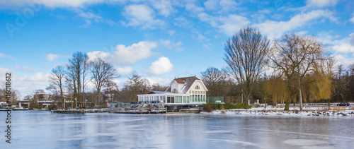 Panorama of a restaurant at the frozen Paterswoldse Meer lake in Groningen, Netherlands