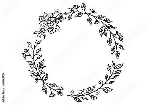 Spring wreath of olive branches with olives. The technique silhouette. The color is black.