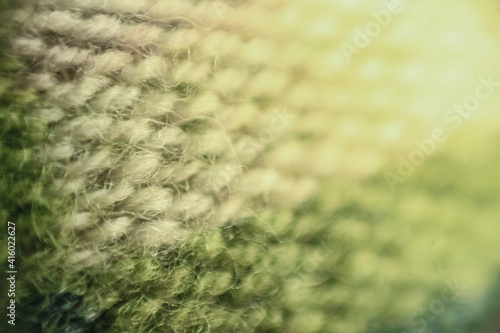 textile and texture concept - extreme close up of checkered fabric background. shallow depth of field. ideal for abstract background 