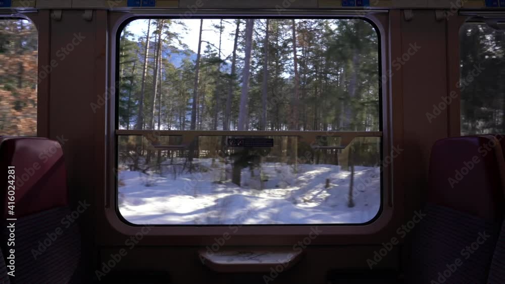 spectacular view from the red train of Bernina, Unesco World Heritage Site - View of the mountains full of snow, the glaciers of the Swiss Alps and a forest of pine trees spectacular view from the red train of Bernina, Unesco World Heritage Site - View of the mountains full of snow, the glaciers of the Swiss Alps and a forest of pine trees