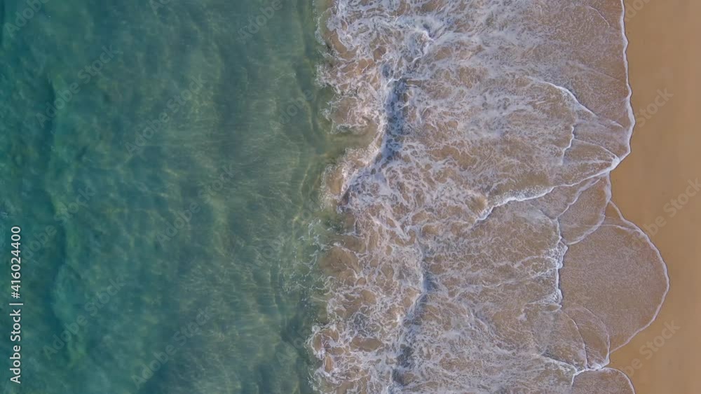 (Top view) Aerial view drone over beach sea. Beautiful sea waves. Beach sand and amazing sea. Summer sunset seascape. Phuket Thailand Beach. Water texture. Top view of the fantastic natural sunsets (Top view) Aerial view drone over beach sea. Beautiful sea waves. Beach sand and amazing sea. Summer sunset seascape. Phuket Thailand Beach. Water texture. Top view of the fantastic natural sunsets