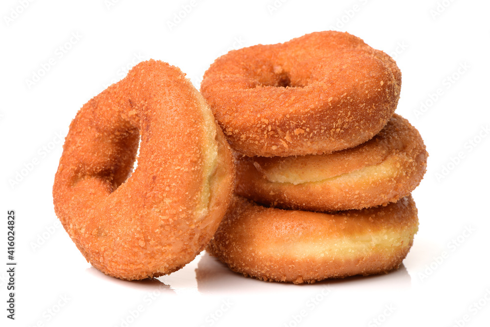 a pile of rosquillas, typical spanish donuts on white background a pile of rosquillas, typical spanish donuts on white background