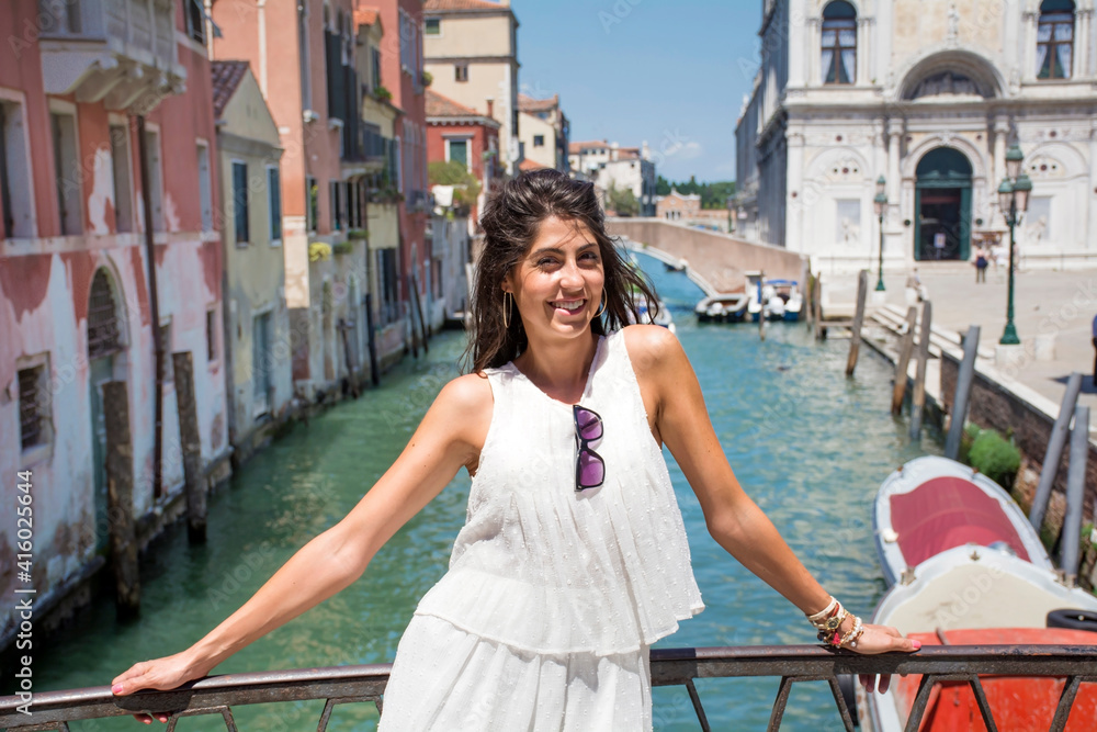 Beautiful Tourist Woman with White Dress  in Venice ,Italy 