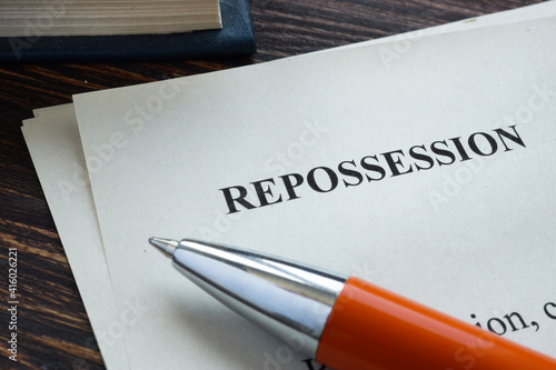 Info about Repossession on the piece of paper. photo