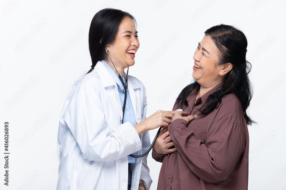 Young Doctor examines elderly asian woman and health check up on heart Young Doctor examines elderly asian woman and health check up on heart
