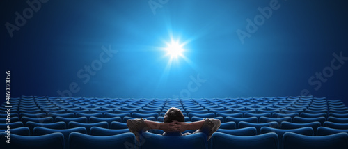 Valokuva Cinema with one person sitting in 21:9 cinemascope format