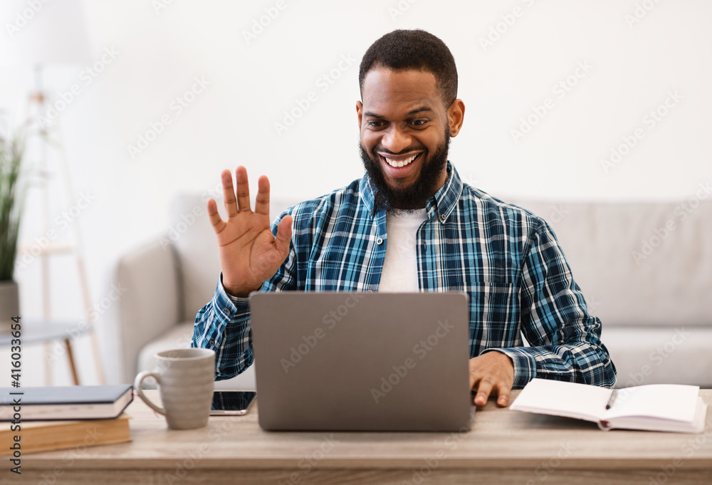 Black Business Guy At Laptop Video Calling Sitting In Office Black Business Guy At Laptop Video Calling Sitting In Office