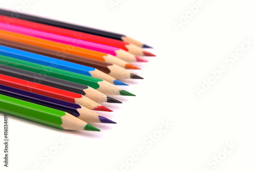 Drawing supplies: many different colored pencils.