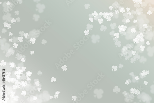 Bokeh background with club symbol pattern.