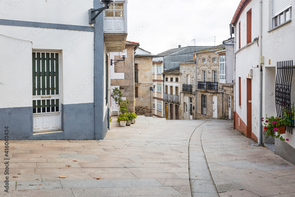 Φωτογραφία a street with typical houses in Sarria town, province of Lugo, Galicia, Spain