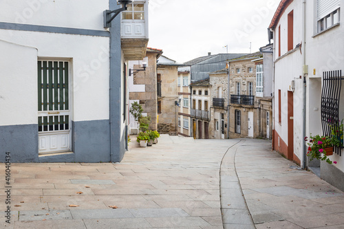 a street with typical houses in Sarria town, province of Lugo, Galicia, Spain photo