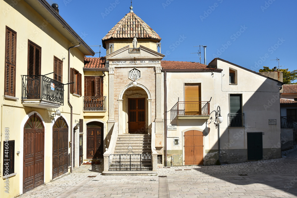 A street among the old stone houses of Paternopoli, a medieval village in the province of Avellino.