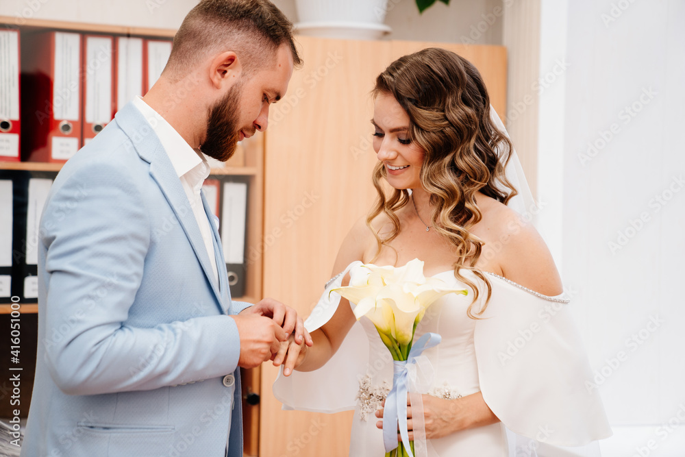 Fototapeta premium couple of newlyweds in the civil registry office.