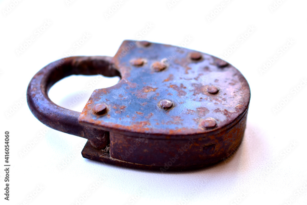 Old curtain padlock on a white background Old curtain padlock on a white background