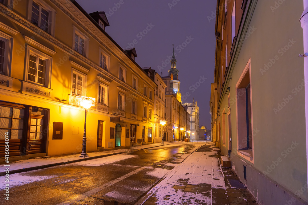 Empty street and Poznan Town Hall in Old Town at night, Poznan, Poland