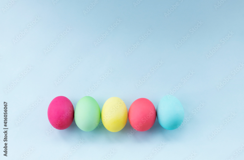 easter eggs dyed in pastel colors against light blue background. Image with copy space easter eggs dyed in pastel colors against light blue background. Image with copy space
