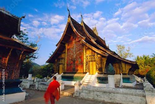 Classic Lao Temple architecture, Wat Xieng Thong, Luang Prabang, Laos photo