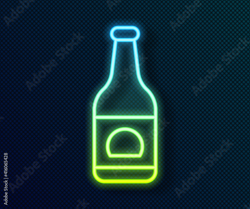 Glowing neon line Beer bottle icon isolated on black background. Vector.