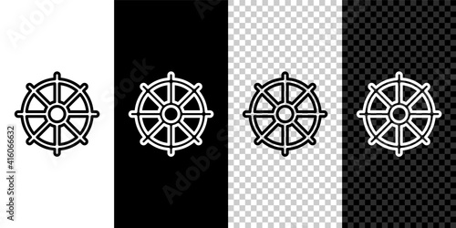 Set line Dharma wheel icon isolated on black and white,transparent background. Buddhism religion sign. Dharmachakra symbol. Vector.
