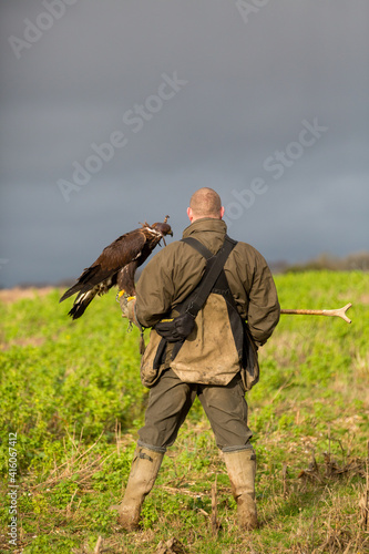 hunter with golden eagle