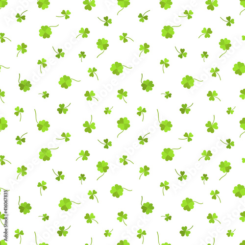 Seamless vector pattern for St. Patrick s Day with clover and quatrefoil on white background  for postcards  gifts  packaging  holiday