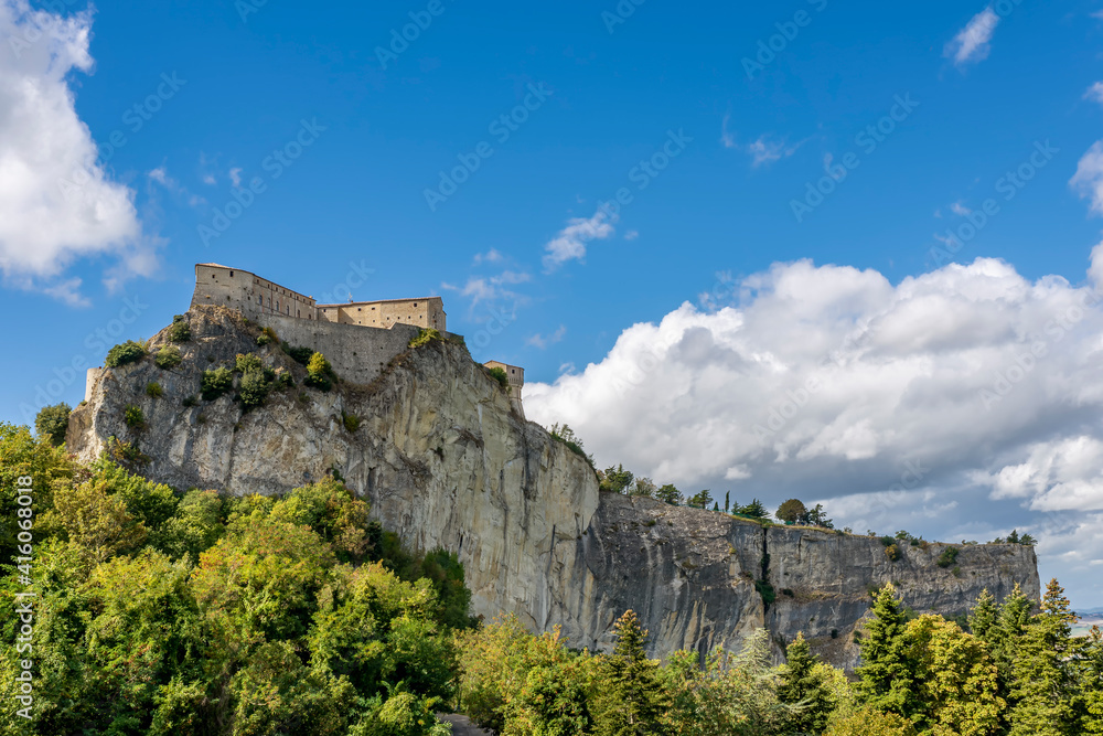 Beautiful view of the rock spur on which the fortress of San Leo stands, Rimini, Italy, on a sunny day