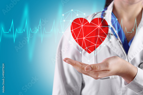 Cardiologist and red heart ...
