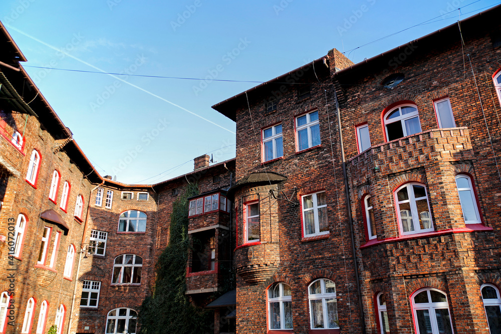 courtyard of old brick buildings of the former mining district of Silesia, Nikiszowiec, Katowice