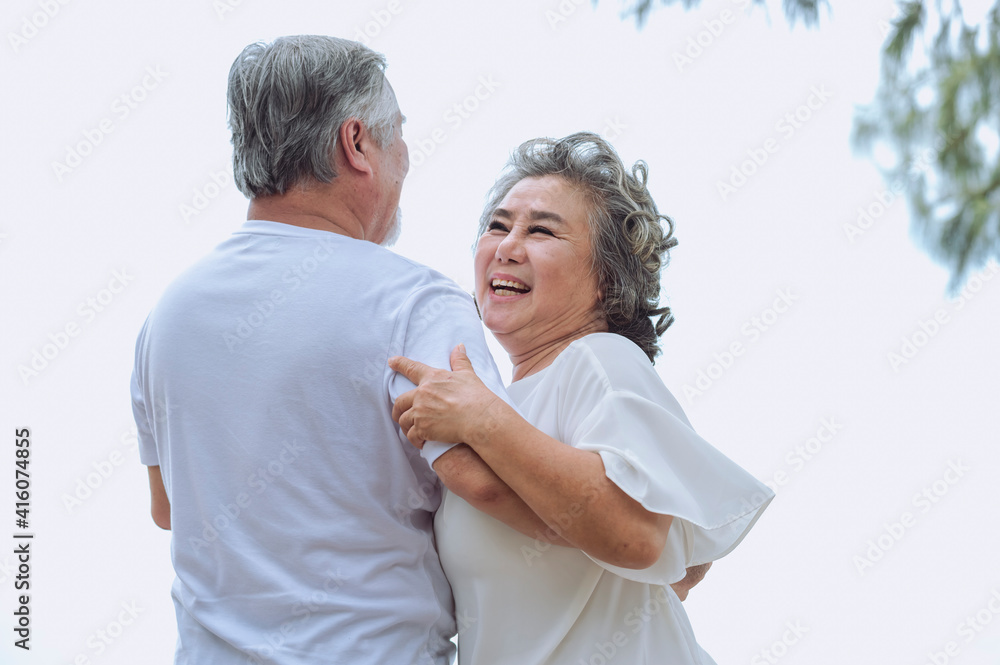 Happy asian senior retired couple, relax smiling elder man and woman enjoying with retired vacation at sea beach outdoor. Health care, Family outdoor lifestyle Happy asian senior retired couple, relax smiling elder man and woman enjoying with retired vacation at sea beach outdoor. Health care, Family outdoor lifestyle