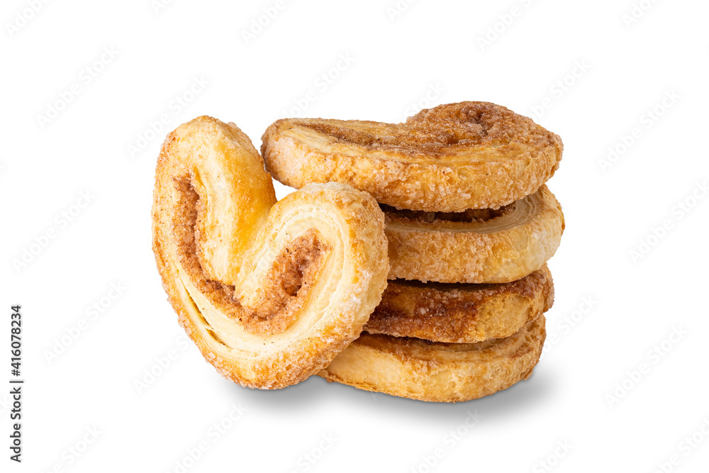 puff crunchy cookies with sugar and cinnamon isolated on white background puff crunchy cookies with sugar and cinnamon isolated on white background