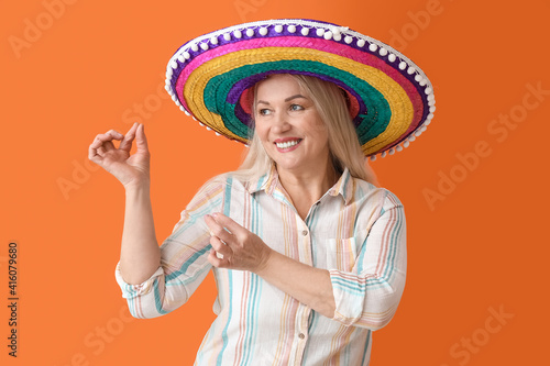 Dancing mature Mexican woma...