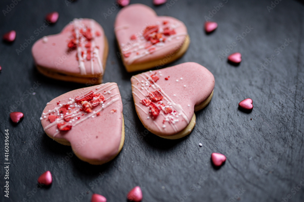 pink heart shaped short bread scotch butter cookies bisquits cakes for wedding, valentines, mothers day love dessert with freeye dried strawberries pink heart shaped short bread scotch butter cookies bisquits cakes for wedding, valentines, mothers day love dessert with freeye dried strawberries