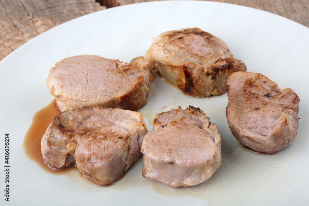 pork fillet meat cooked with sauce pork fillet meat cooked with sauce
