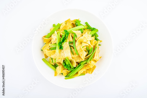 Chinese food, a dish of fried tofu skin with celery