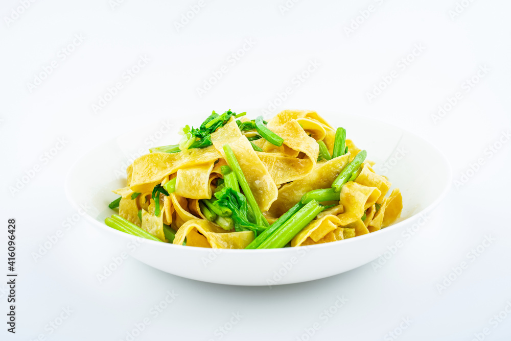 Chinese food, a dish of fried tofu skin with celery Chinese food, a dish of fried tofu skin with celery