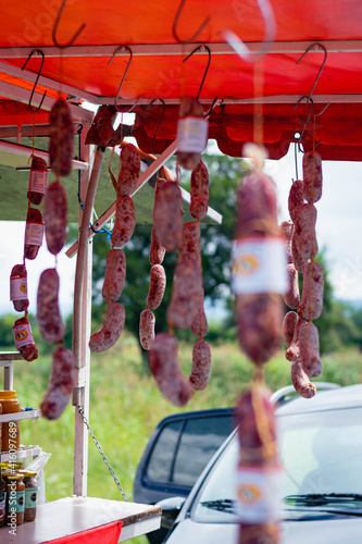 salami in a traditional route stall Argentine food of meat and fat in animal gut