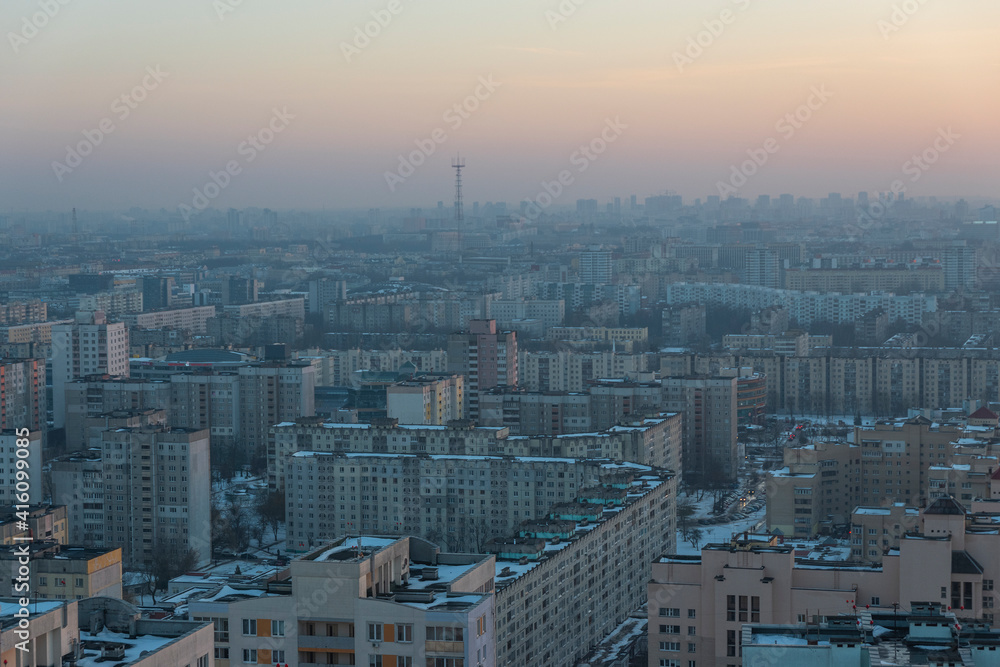 Fototapeta premium Minsk roofs of houses at sunset