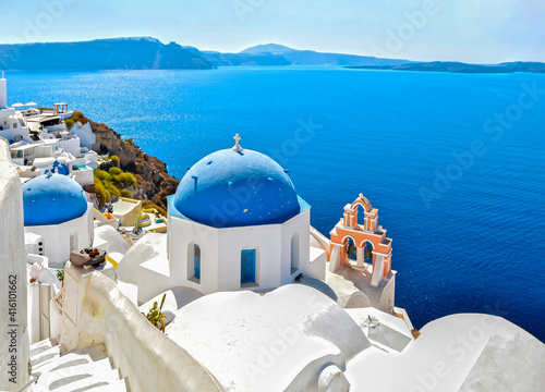 traditional greek church over the blue sea of       the aegean sea 
