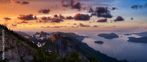 Panoramic landscape view of Howe Sound during a vibrant summer morning. Dramatic Sunrise Sky Art Render. Taken from the top of Brunswick Mountain, North of Vancouver, BC, Canada. Nature Background